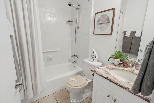 full bathroom featuring tile patterned flooring, vanity, toilet, and shower / bath combo with shower curtain