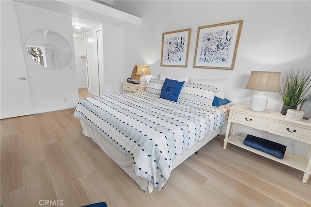 bedroom featuring light wood-type flooring