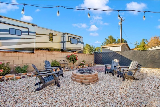 view of patio / terrace with a fire pit