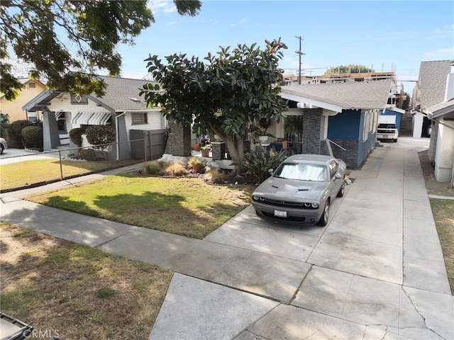 view of front of home with a front yard