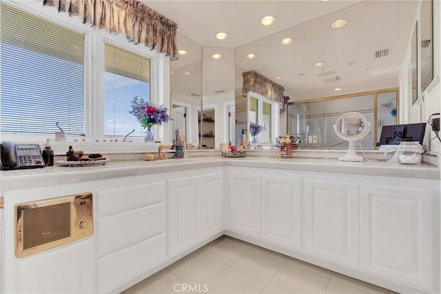 bathroom with tile patterned floors and sink