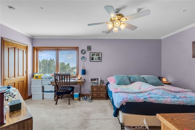 bedroom featuring ceiling fan, light carpet, and ornamental molding