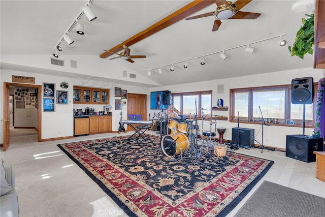 interior space featuring bar, vaulted ceiling with beams, and ceiling fan