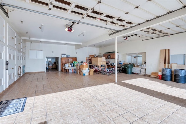 garage featuring a garage door opener