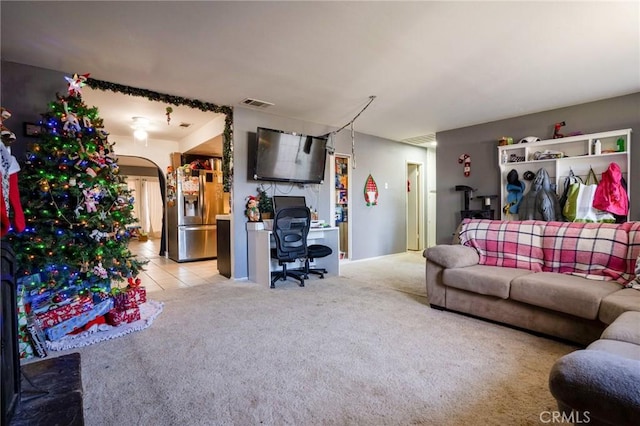 living room featuring light colored carpet