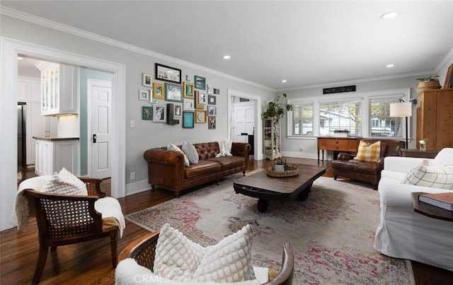 living room with dark hardwood / wood-style flooring and crown molding