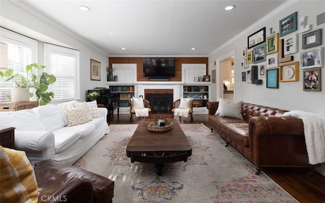 living room featuring dark hardwood / wood-style floors and ornamental molding