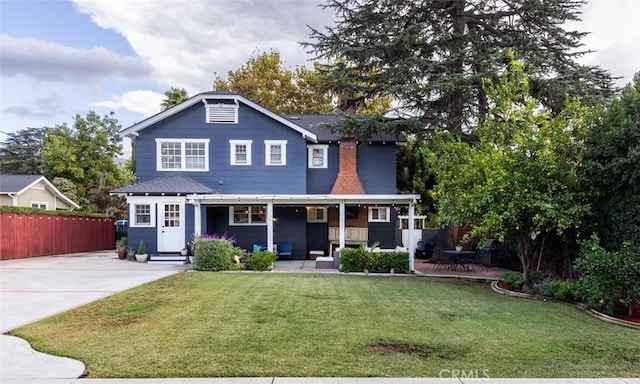 view of front of home with a front yard