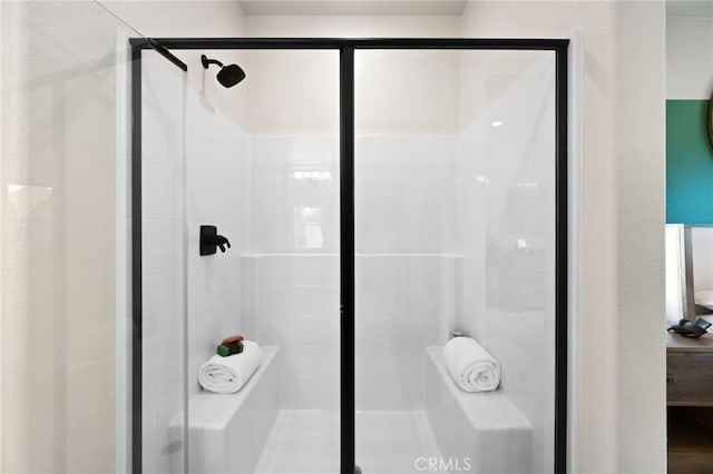 bathroom featuring walk in shower