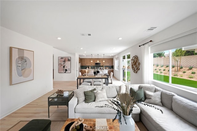 living room featuring light wood-type flooring