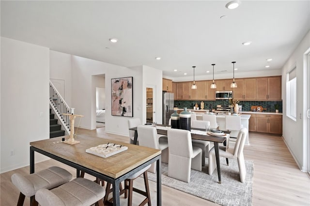 dining room featuring light hardwood / wood-style floors