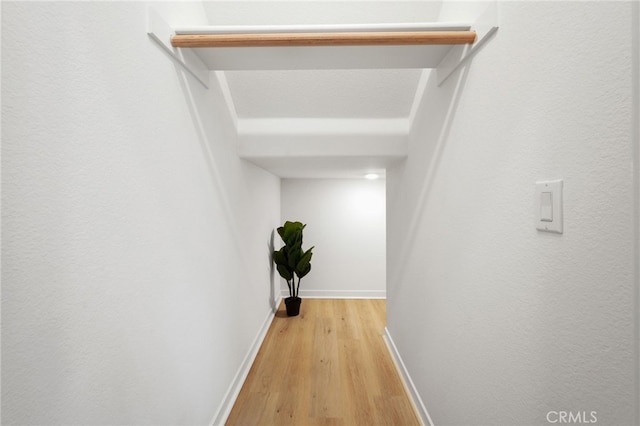 corridor featuring light hardwood / wood-style flooring