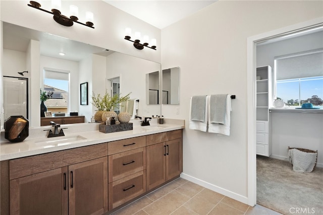 bathroom featuring tile patterned floors and vanity