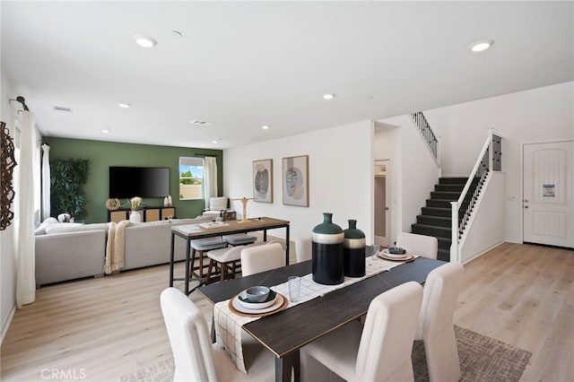 dining room with light wood-type flooring