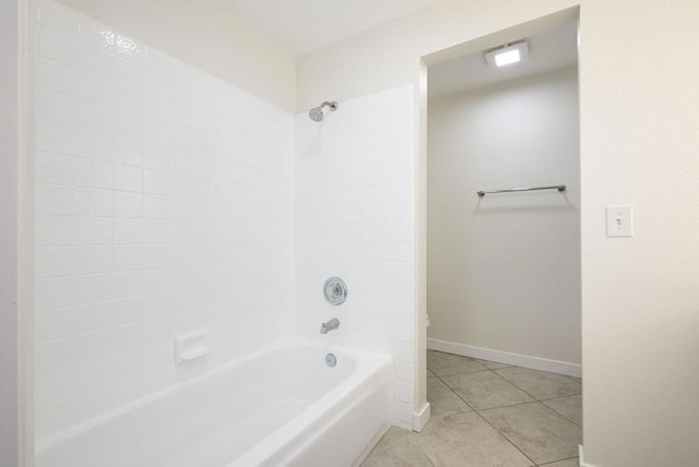 bathroom featuring tile patterned flooring and shower / washtub combination