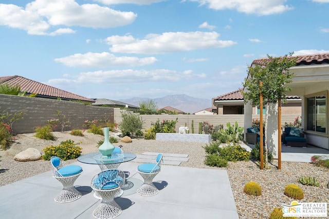 view of patio featuring a mountain view