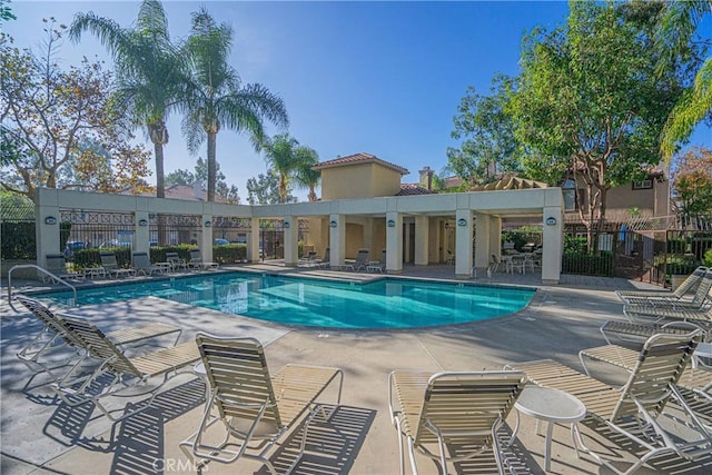 view of swimming pool featuring a patio