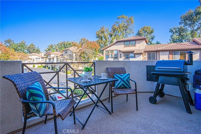 balcony featuring area for grilling