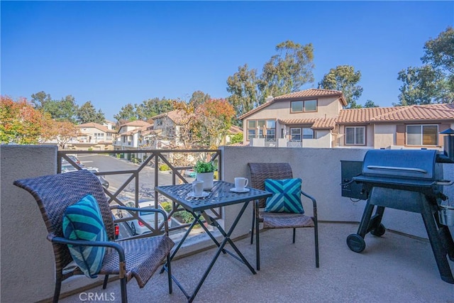 balcony featuring a grill