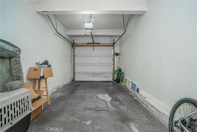 garage featuring a garage door opener