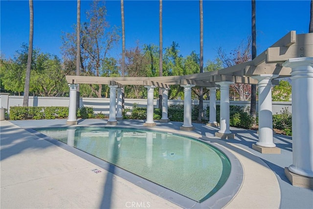 view of pool with a pergola