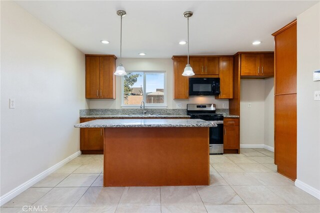 kitchen with a kitchen island, stainless steel stove, light stone counters, and pendant lighting