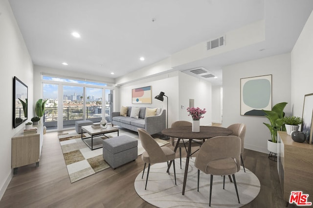 dining area featuring dark hardwood / wood-style flooring