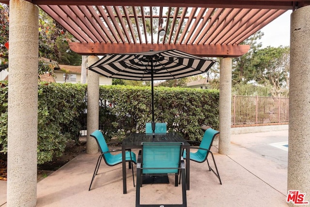 view of patio featuring a pergola