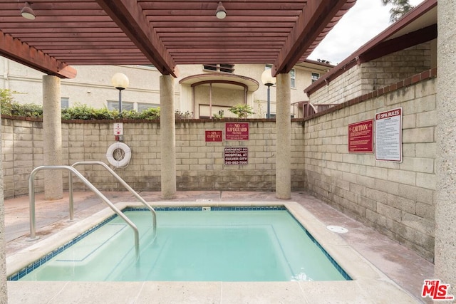 view of pool featuring a pergola