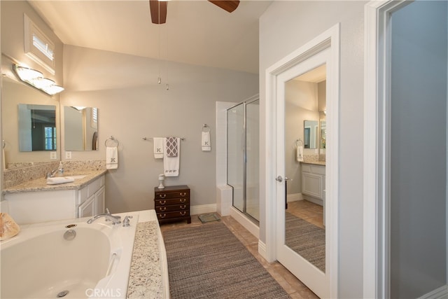 bathroom with tile patterned flooring, vanity, ceiling fan, and independent shower and bath