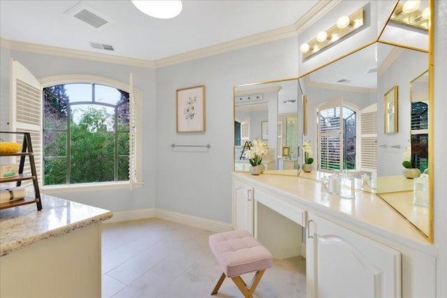 bathroom featuring tile patterned flooring and crown molding