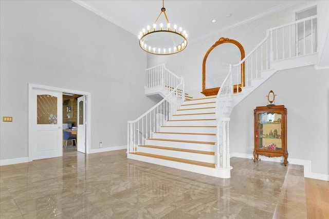 staircase featuring a notable chandelier