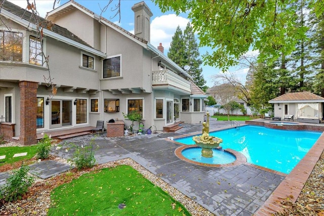 view of pool with a patio