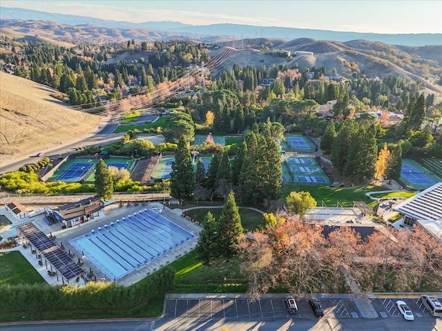 birds eye view of property with a mountain view