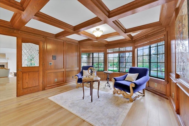 sunroom / solarium featuring beamed ceiling and coffered ceiling