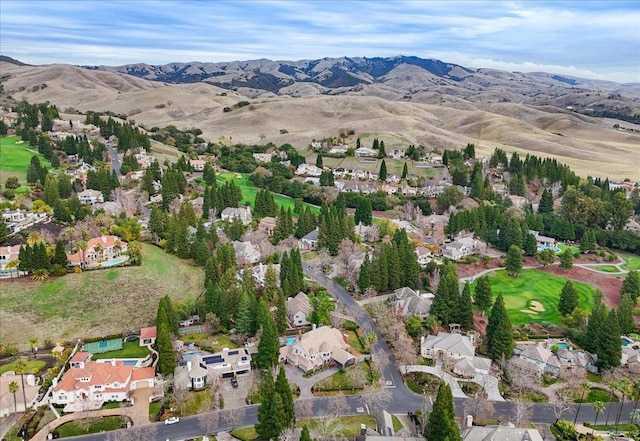 drone / aerial view featuring a mountain view