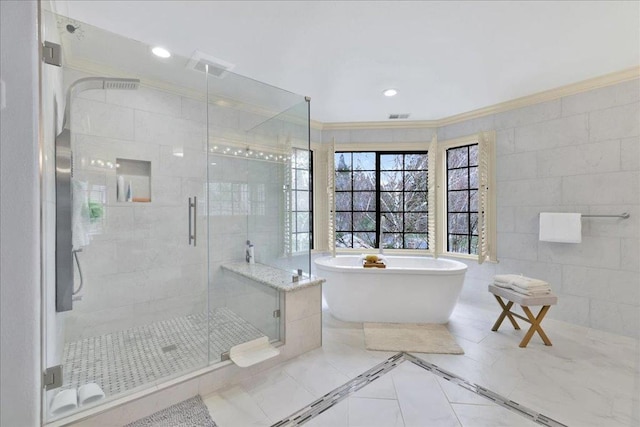 bathroom featuring tile walls, tile patterned flooring, independent shower and bath, and ornamental molding