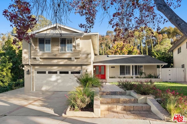 front facade with a garage