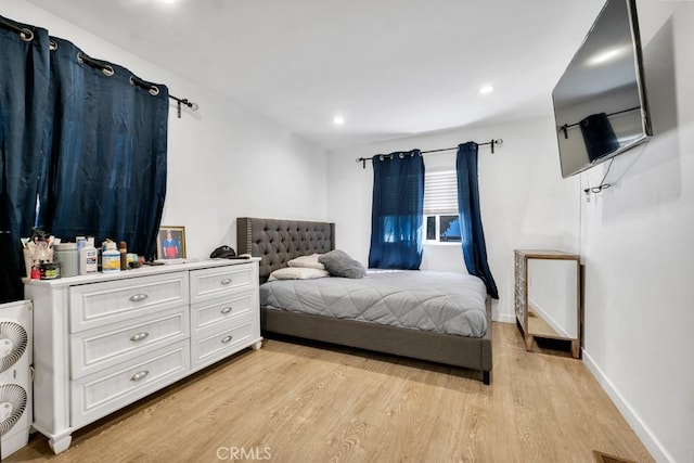 bedroom featuring light wood-type flooring