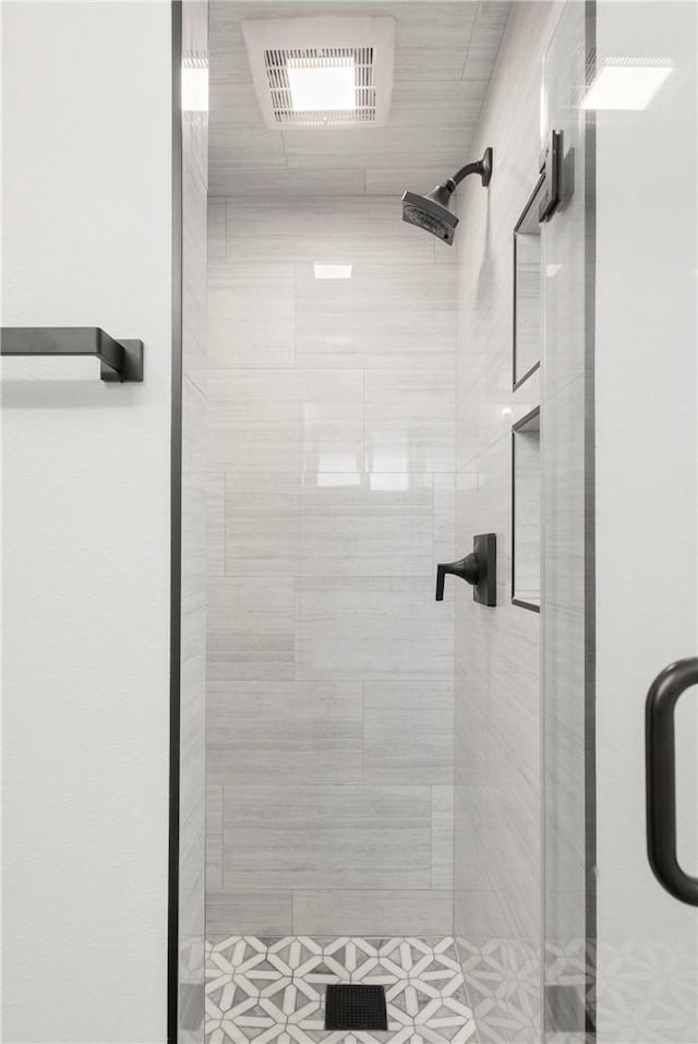 bathroom featuring walk in shower