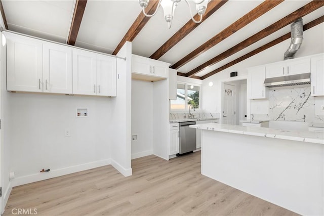 kitchen with white cabinets, lofted ceiling with beams, light stone countertops, and dishwasher