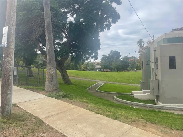 view of community featuring a yard