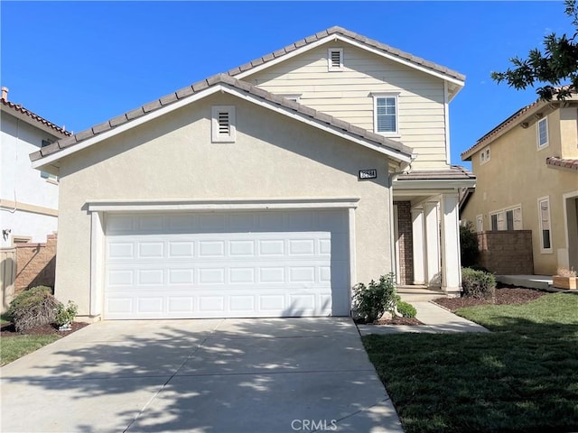 view of front of home with a garage