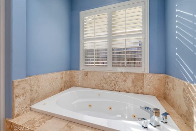 bathroom with tiled tub