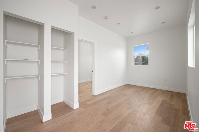 unfurnished bedroom featuring light hardwood / wood-style flooring