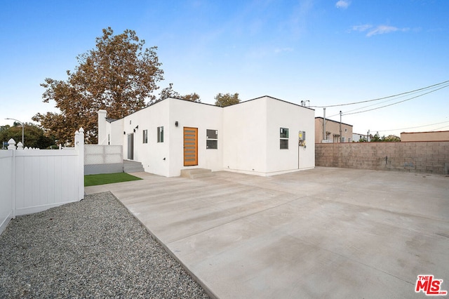 rear view of property with a patio