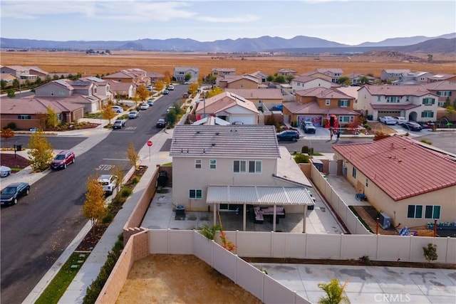 drone / aerial view featuring a mountain view