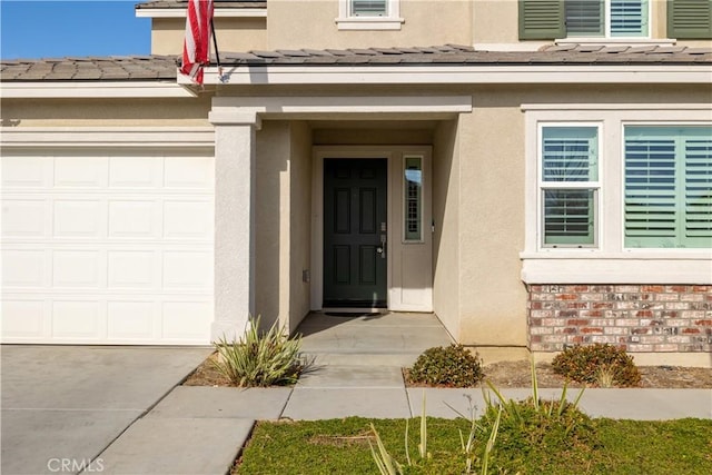 property entrance with a garage