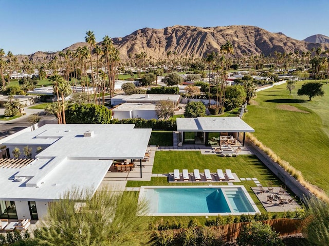 birds eye view of property featuring a mountain view