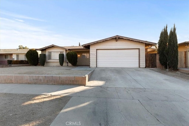 single story home featuring a garage